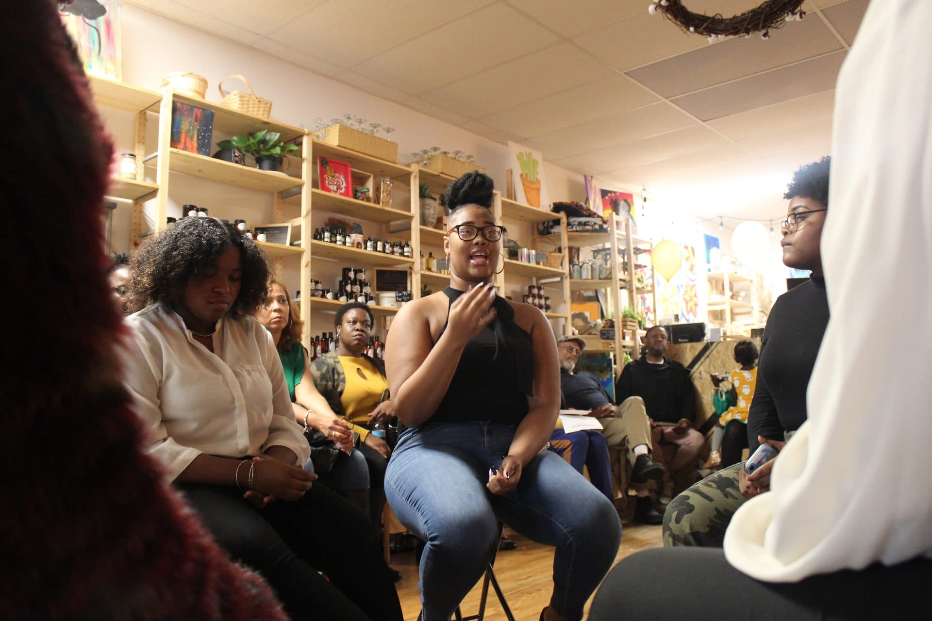 A group of GMG members gathered inside a bookstore for a community event.