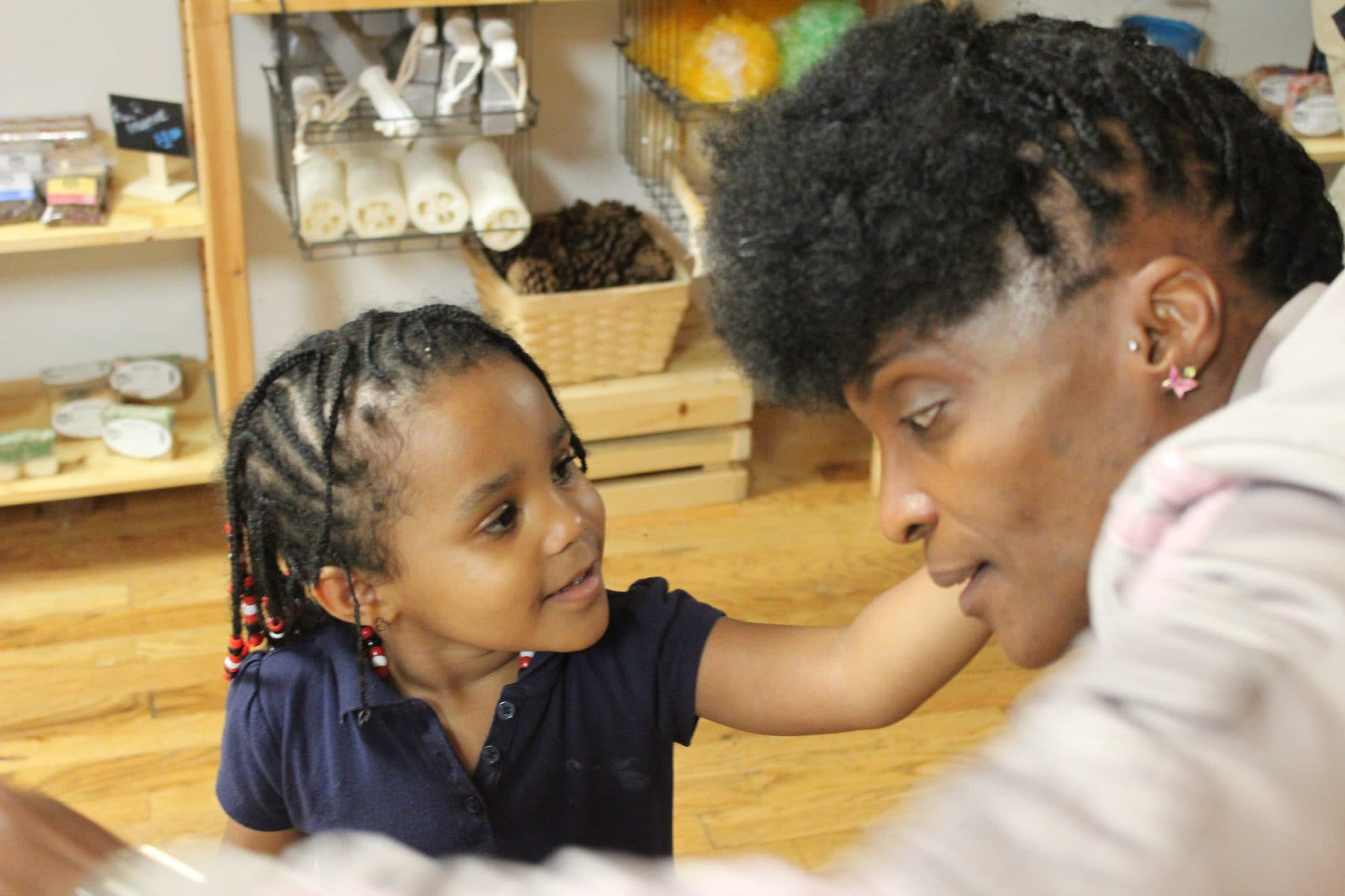 A mentor and mentee interacting warmly.